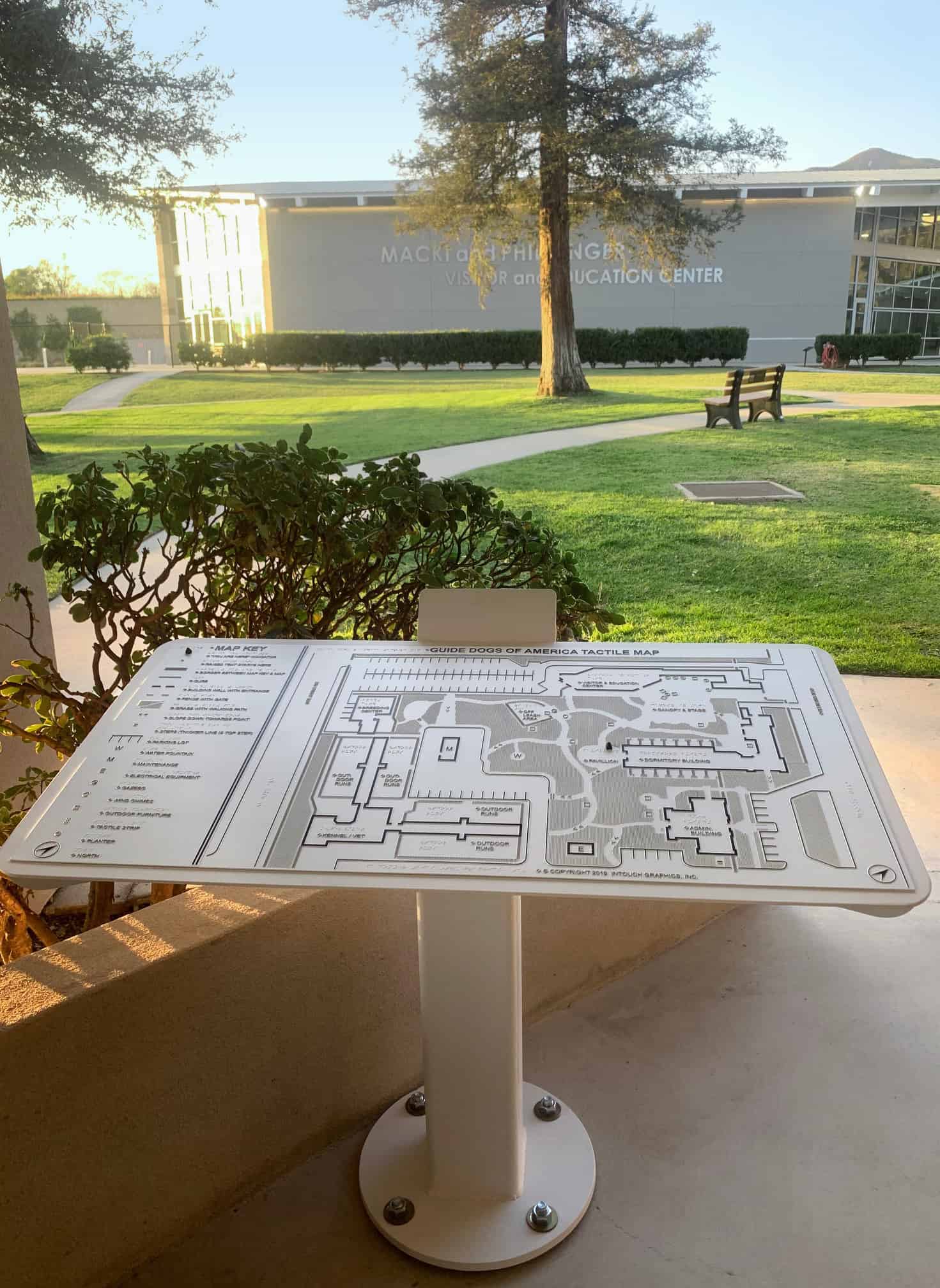 Tactile map mounted on outdoor post, Guide Dogs of America campus